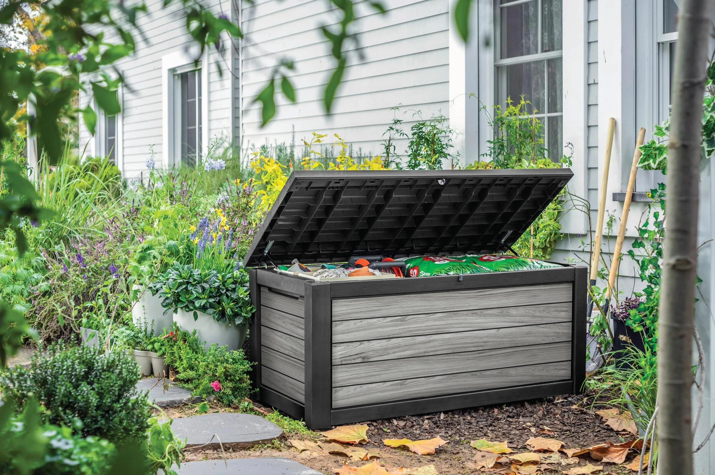 Keter Northwood Boîte de rangement/boîte à coussins 623 l | 100 % étanche avec ventilation donc pas d'odeur désagréable / moisissure, aspect bois moderne, couvercle pouvant supporter jusqu'à 250 kg
