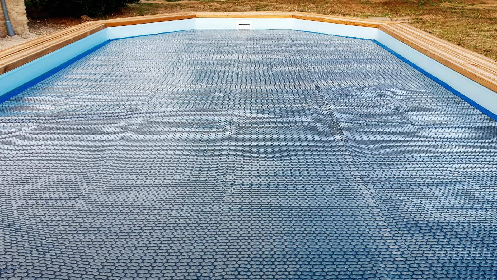 Bâche à Bulles Piscine 4 Saisons EnergyGuard 500 microns Bordée 4 côtés Oeillets Posés