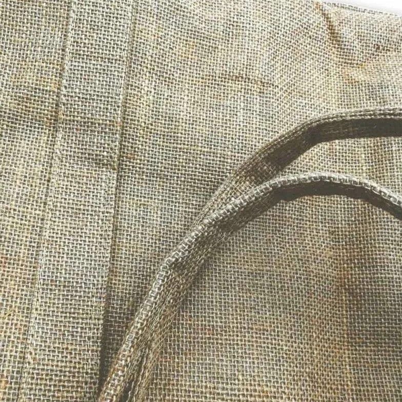 Sac à bûches marron en toile de jute plastifié 30x60x40cm