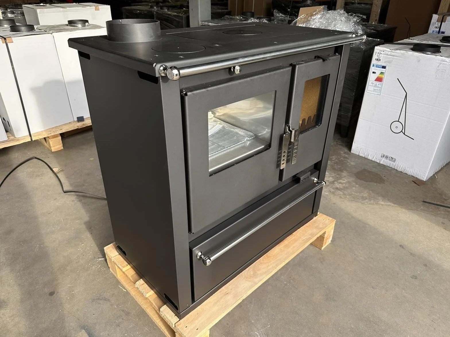 Poêle à bois Verso Cs Plus à gauche 7,7 kW grand compartiment de cuisson acier inoxydable