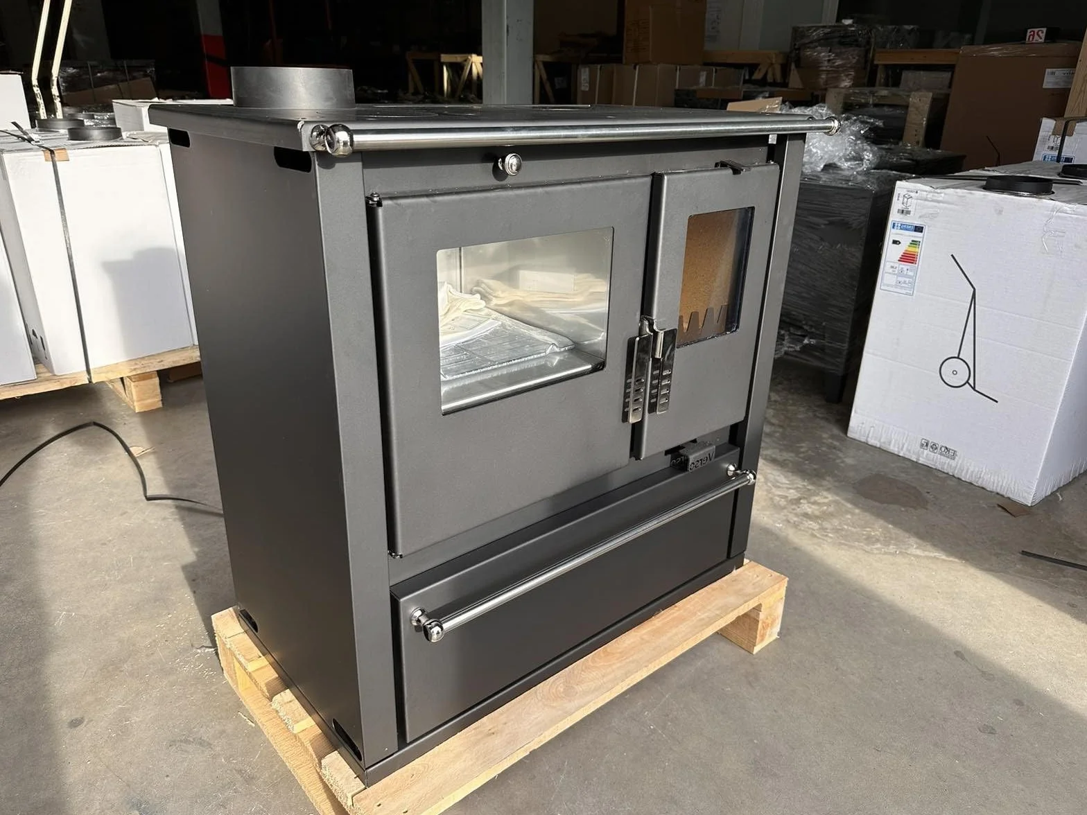 Poêle à bois Verso Cs Plus à gauche 7,7 kW grand compartiment de cuisson acier inoxydable