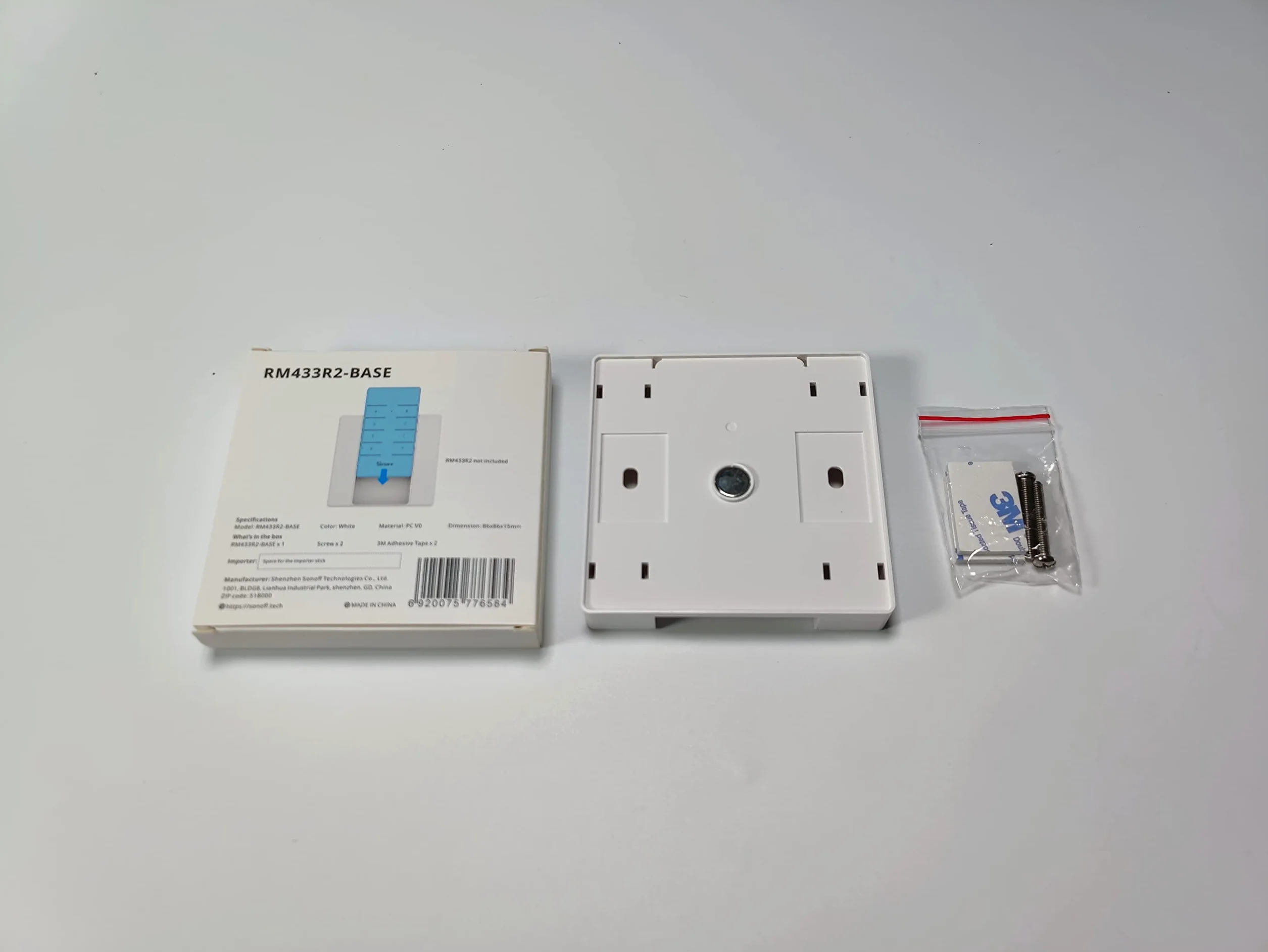 Wall-mounted base for Sonoff RM433 remote control